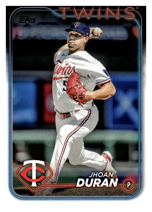 Jhoan Duran mid-pitch for Minnesota Twins featured on 2024 Topps baseball card