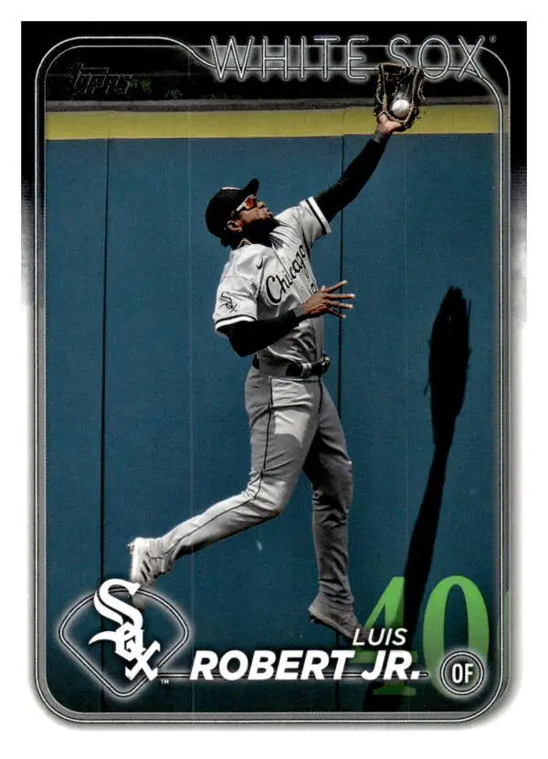 Luis Robert leaps in a White Sox uniform for a catch on this Chicago White Sox baseball card