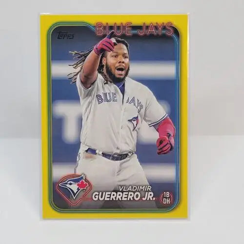 Baseball card of Vladimir Guerrero Jr. in white uniform, Yellow Border Parallel insert