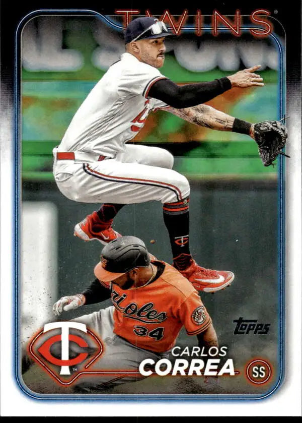 Carlos Correa leaps to avoid a sliding Orioles player in Minnesota Twins Baseball Card