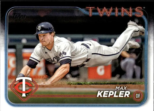 Baseball player Max Kepler diving for a catch in Minnesota Twins uniform on trading card