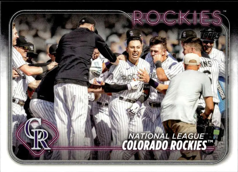 Colorado Rockies players celebrate on the field for a Team Card baseball card