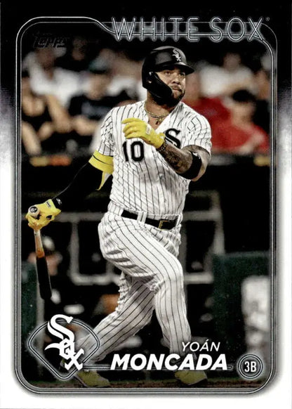 Baseball card of Yoan Moncada in White Sox pinstriped uniform swinging bat