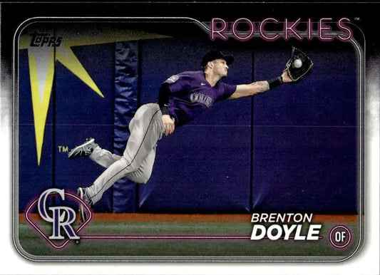 Brenton Doyle making a leaping catch in Colorado Rockies uniform baseball card image