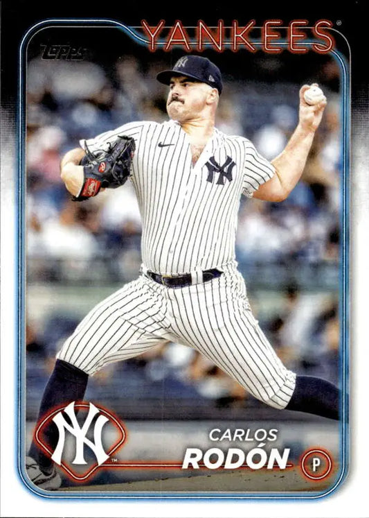 Carlos Rodon delivers a pitch in New York Yankees pinstripes on 2024 Topps card