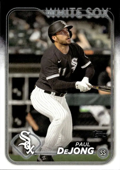 Baseball card of Paul DeJong in black and white Chicago White Sox uniform at bat