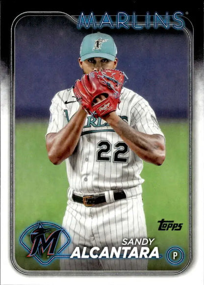 Sandy Alcantara pitching for Miami Marlins in pinstriped uniform on baseball card