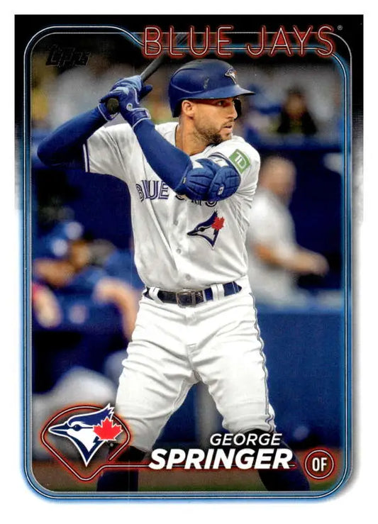 George Springer in Toronto Blue Jays uniform at bat on 2024 Topps baseball card