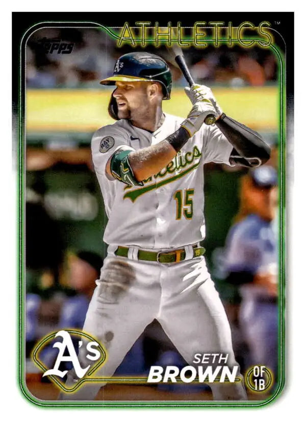 Seth Brown batting in a white uniform on 2024 Topps Oakland Athletics Baseball Card