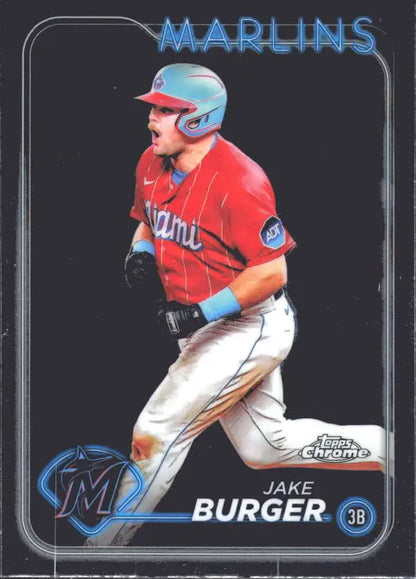 Jake Burger running the bases in a Miami Marlins red jersey Topps Chrome baseball card