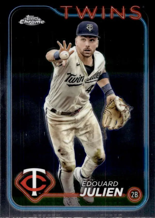 Edouard Julien fielding in cream uniform on Minnesota Twins baseball card