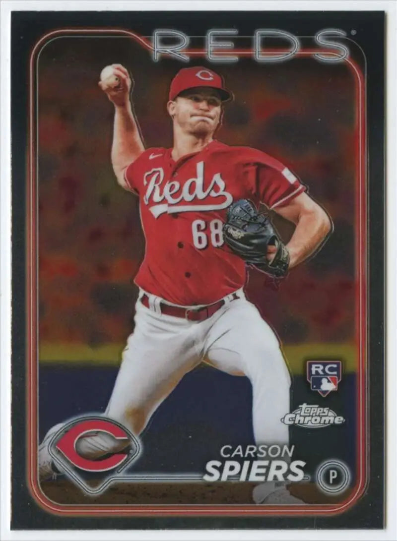 Baseball card of Carson Spiers in throwing motion for Cincinnati Reds Topps Chrome