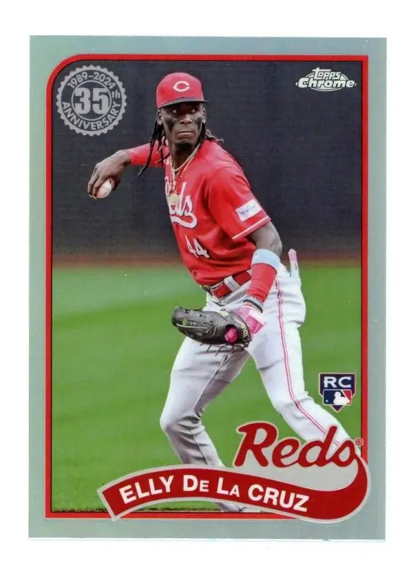 Cincinnati Reds baseball card featuring Elly De La Cruz in a red uniform throwing