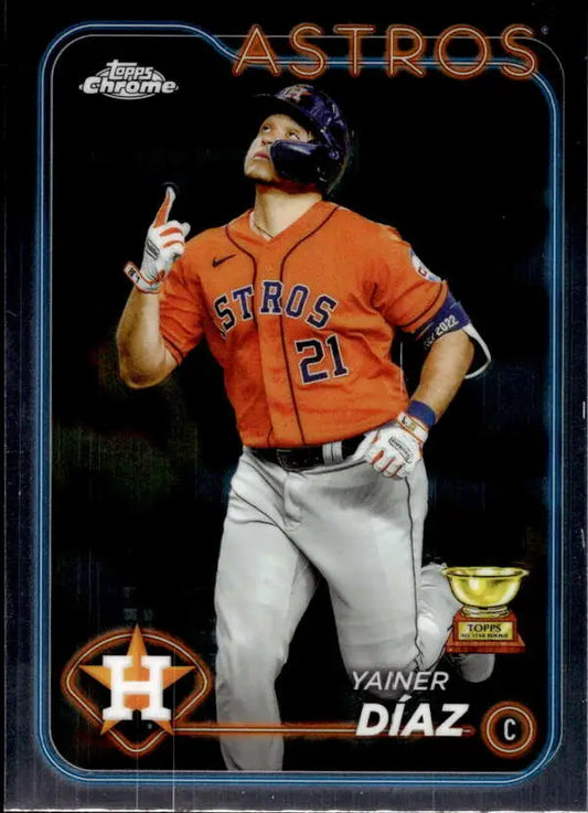 Yainer Diaz in orange jersey pointing up on 2024 Topps Chrome Houston Astros card