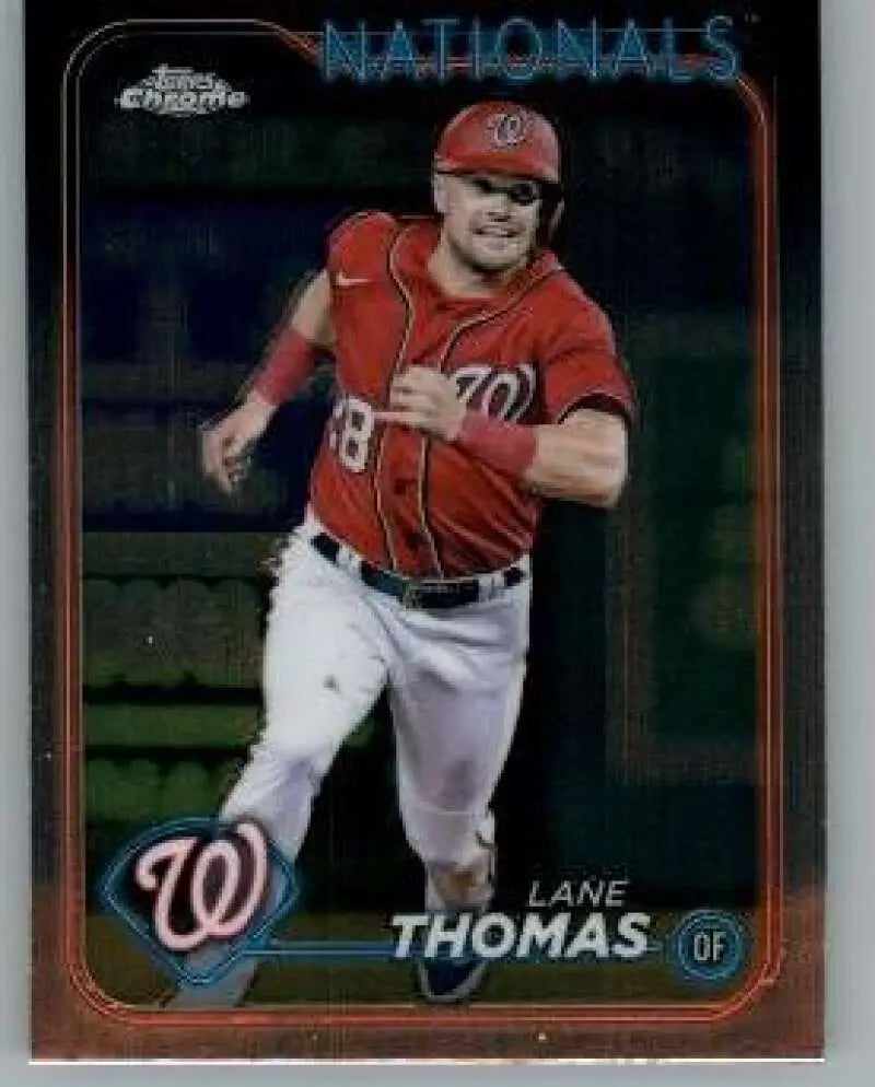 Lane Thomas running on the field in a red uniform Washington Nationals baseball card