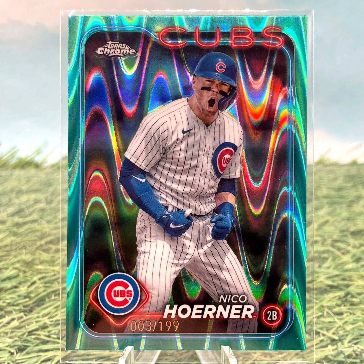 Chicago Cubs Topps Chrome trading card featuring Nico Hoerner with teal chrome border