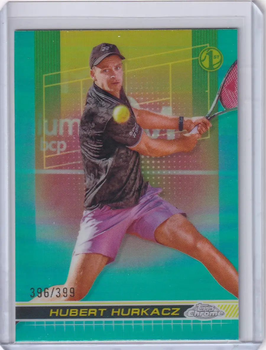 Tennis trading card of Hubert Hurkacz in black shirt and pink shorts, Topps Chrome Aqua