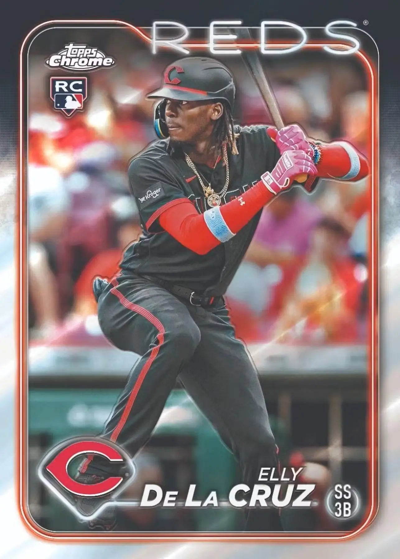 Cincinnati Reds player in black uniform at bat on a refractor parallel baseball card