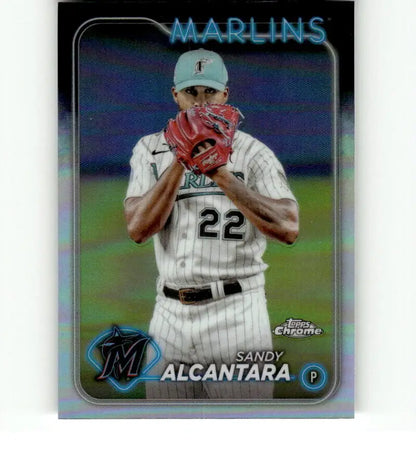 Baseball card of Sandy Alcantara in pinstriped uniform, showcasing Topps Chrome Refractor