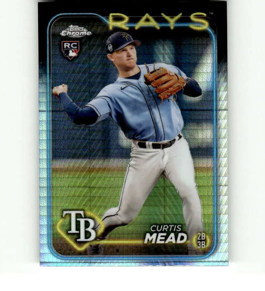 Baseball card of Curtis Mead in gray Tampa Bay Rays uniform throwing a ball refractor prism