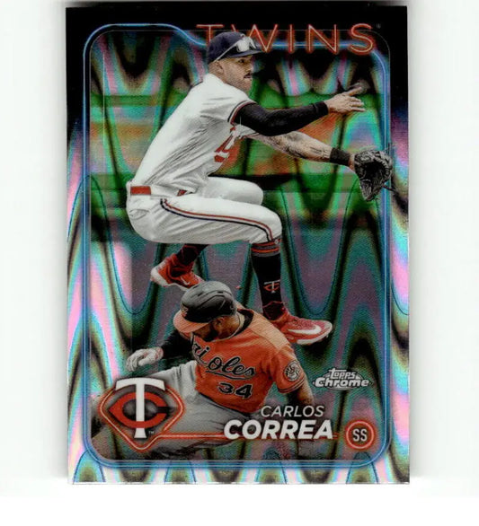 Carlos Correa leaps over a sliding Astros player in a Topps Chrome Refractor RayWave card