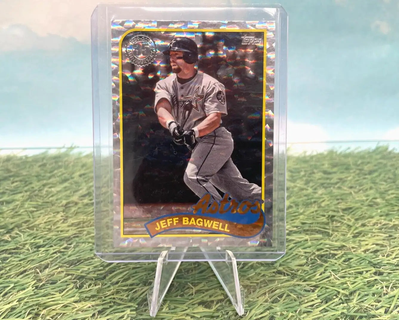 Baseball card in protective case on stand, 2024 Topps Series 1 35th Anniversary Silver Foilboard