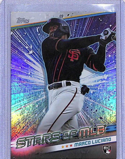 Marco Luciano swinging bat in black uniform on 2024 Topps Series card for San Francisco Giants