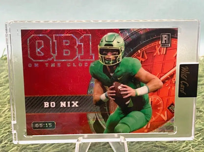 Bo Nix football card featuring Oregon Ducks QB1 in orange parallel, rookie card #05/15