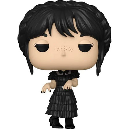 Wednesday Addams Funko Pop figure in black ruffled dress with dark hair and freckles