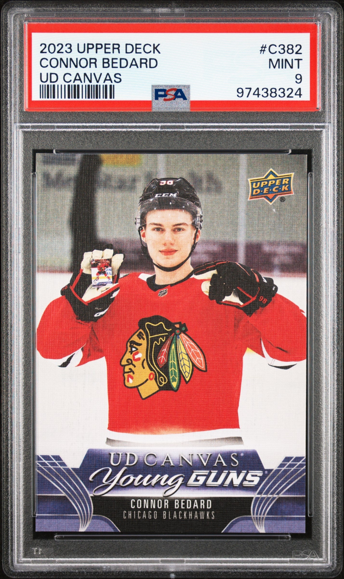 PSA-graded Connor Bedard 2023 Upper Deck Canvas #382 hockey card in red jersey