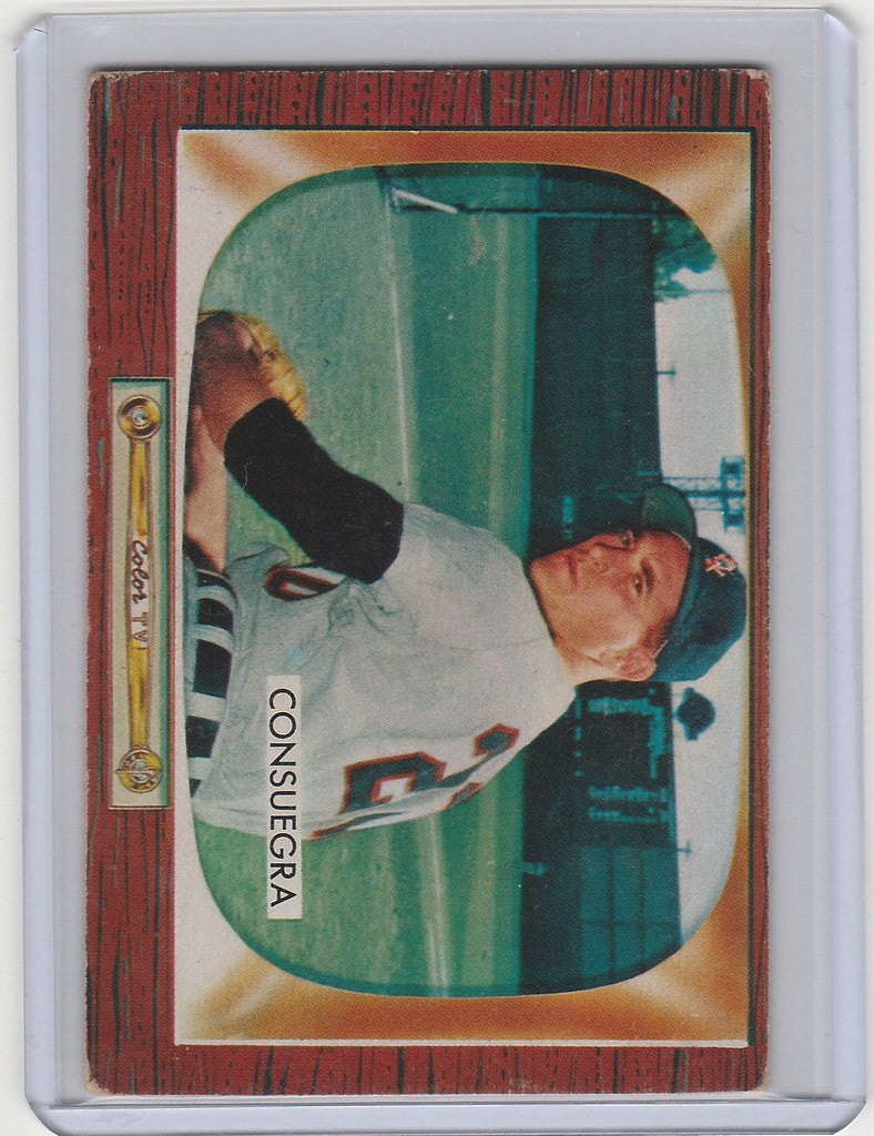 Baseball card of Sandalio Consuegra in Chicago White Sox uniform with green accents