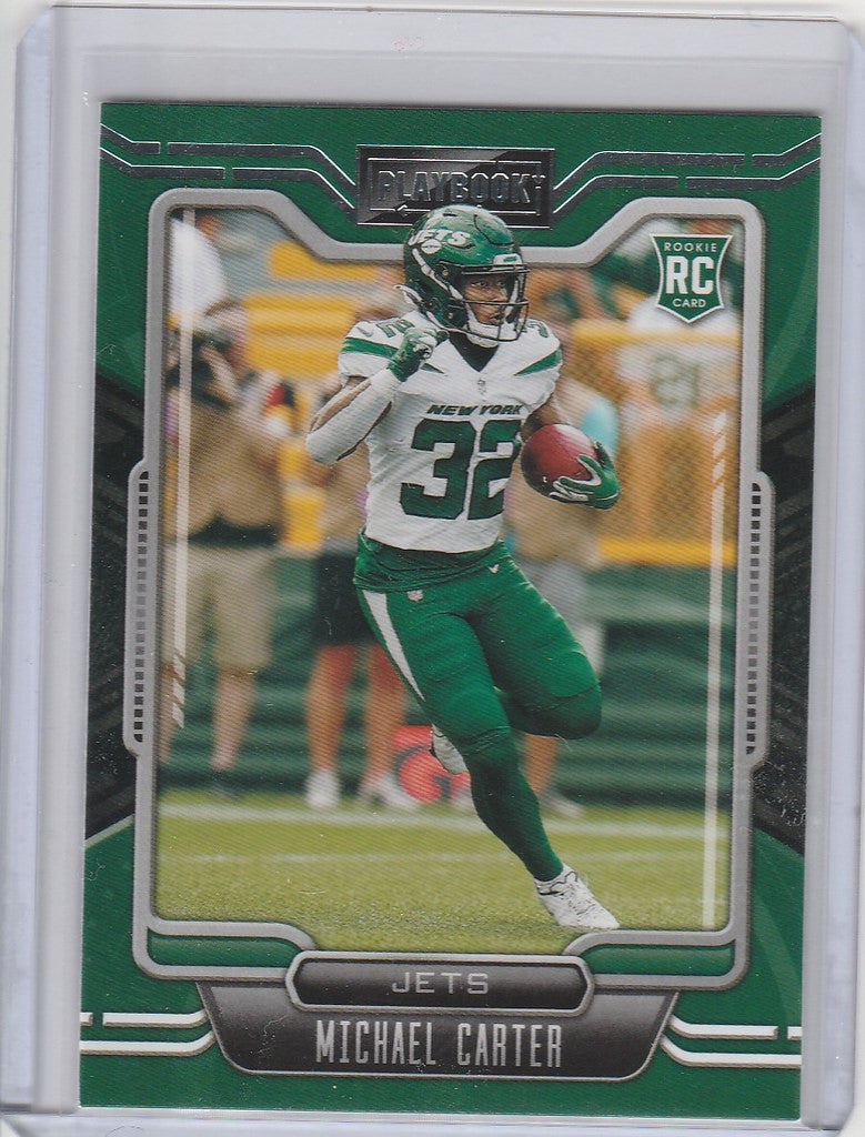 Michael Carter running with the ball on a Panini Playbook New York Jets trading card