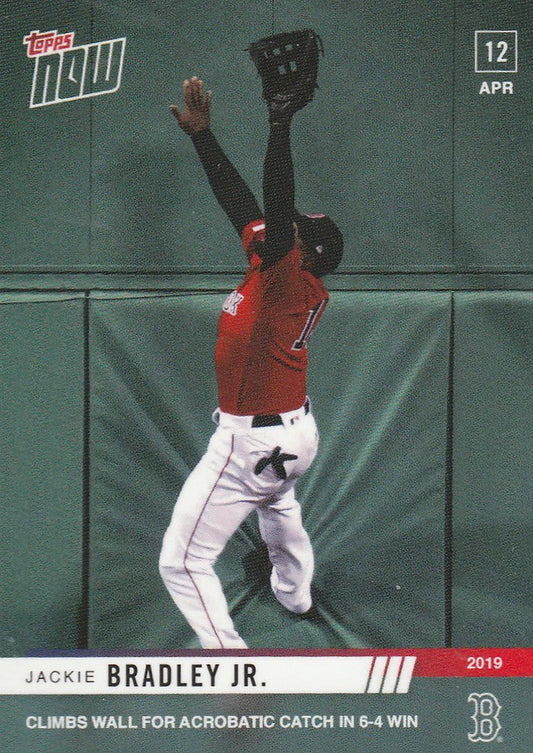 Baseball player in red jersey makes acrobatic catch climbing wall for Red Sox