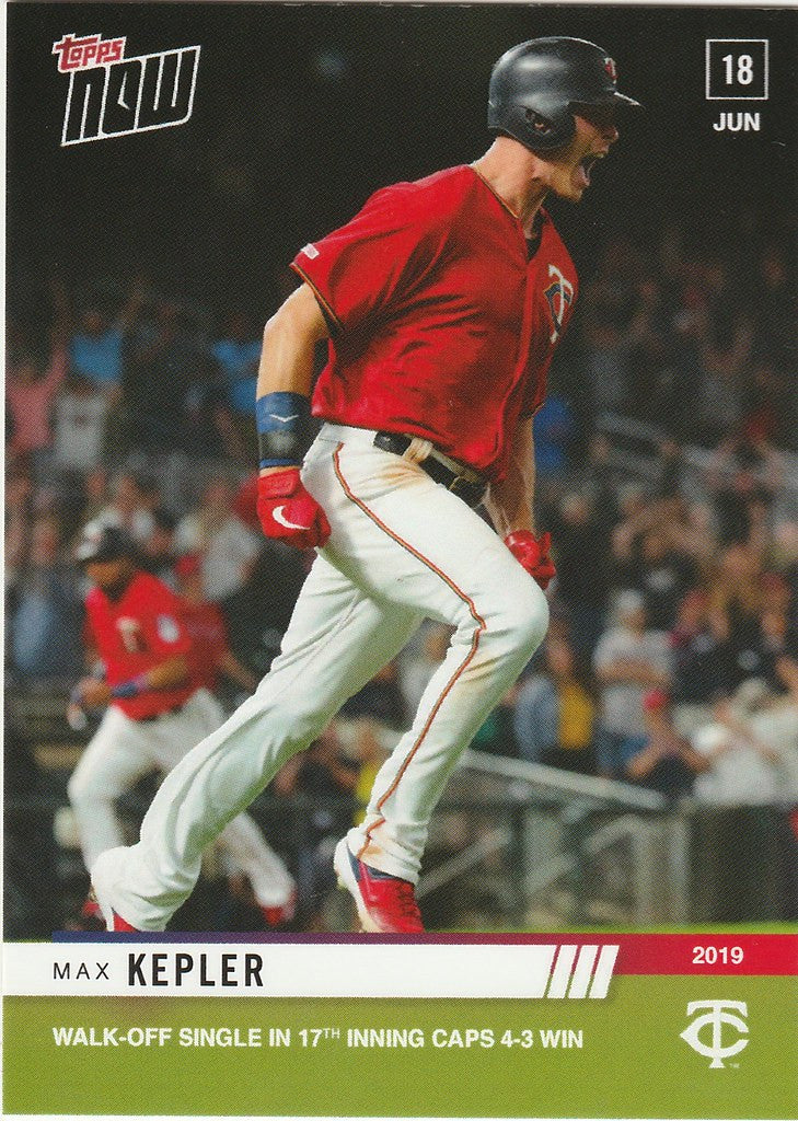 Baseball player Max Kepler in red jersey swinging bat during Minnesota Twins game