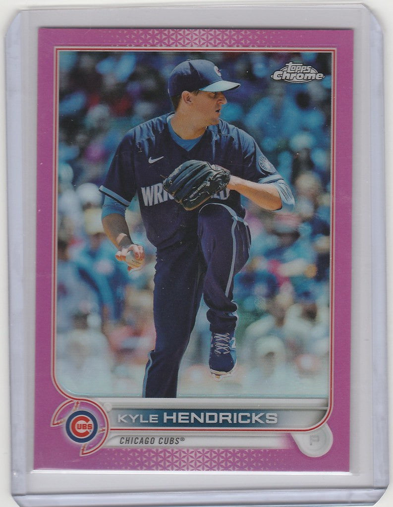 Baseball card of Kyle Hendricks in navy uniform, showcasing Topps Chrome Pink design