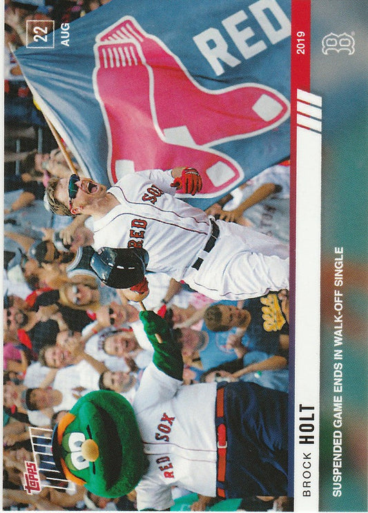 Brock Holt celebrating a walk-off in front of the Boston Red Sox team flag baseball card