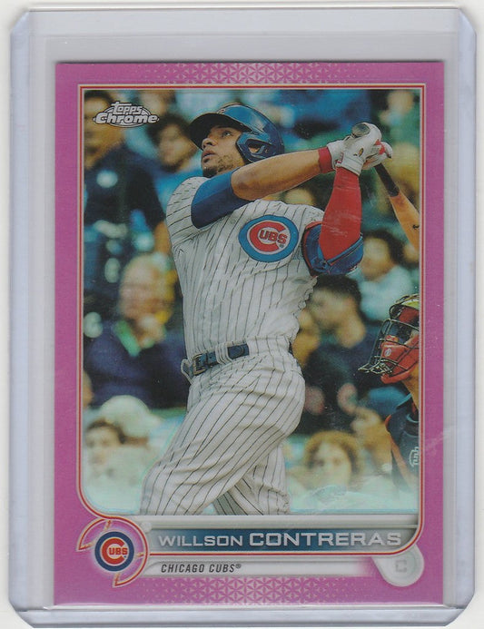 Baseball card of Willson Contreras swinging bat for Chicago Cubs in Topps Chrome Pink