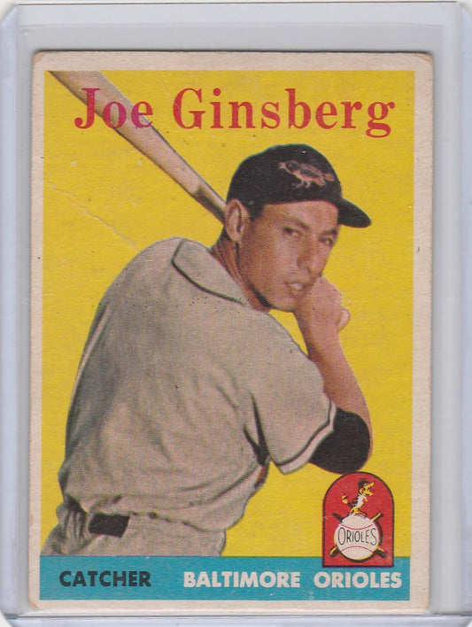 Vintage Topps Baseball card of Joe Ginsberg, Baltimore Orioles catcher in batting pose