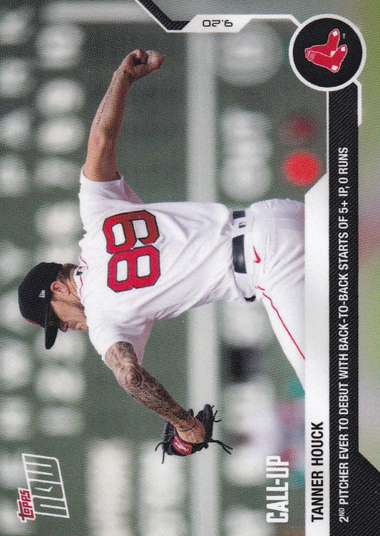 Baseball player Tannor Houck in white uniform mid-pitch for Boston Red Sox