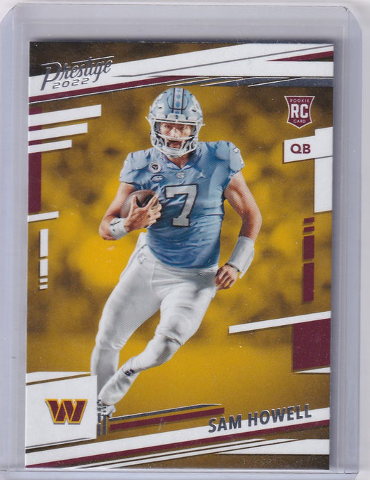 Football trading card of Sam Howell Washington Commander in light blue jersey running