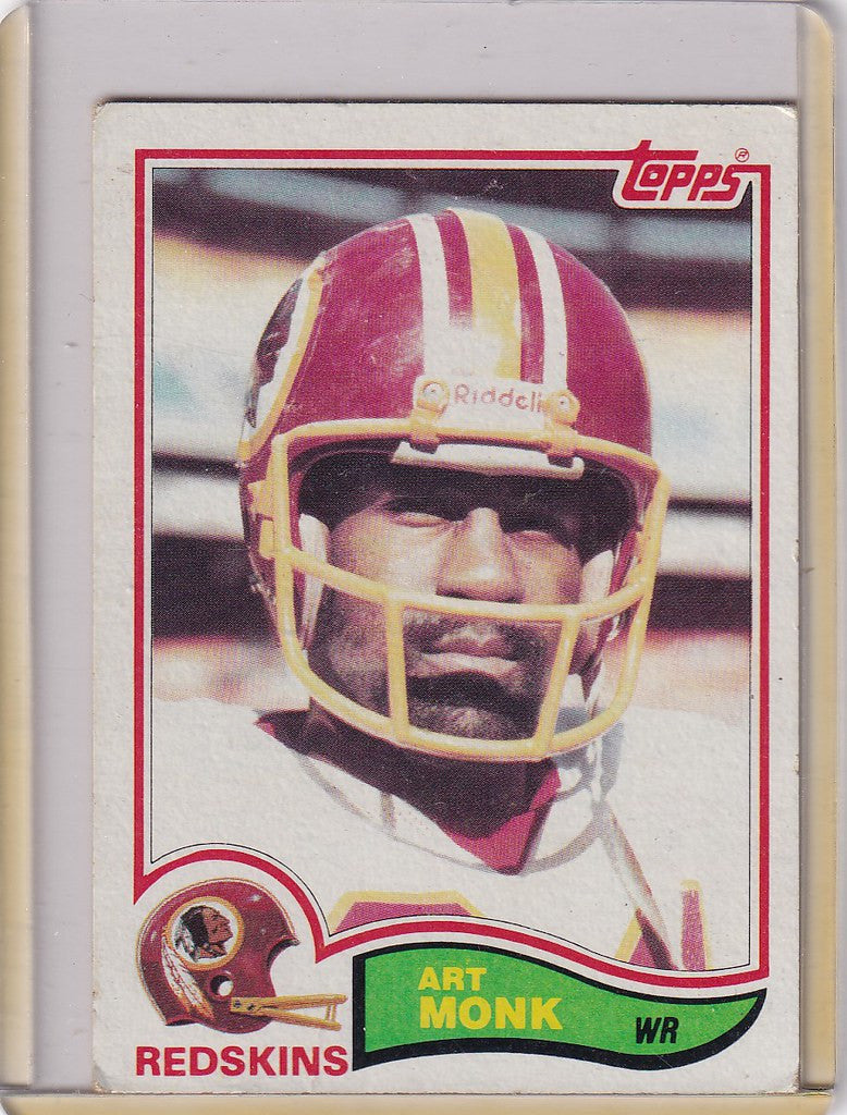 Football trading card of Art Monk Washington wearing burgundy and gold helmet