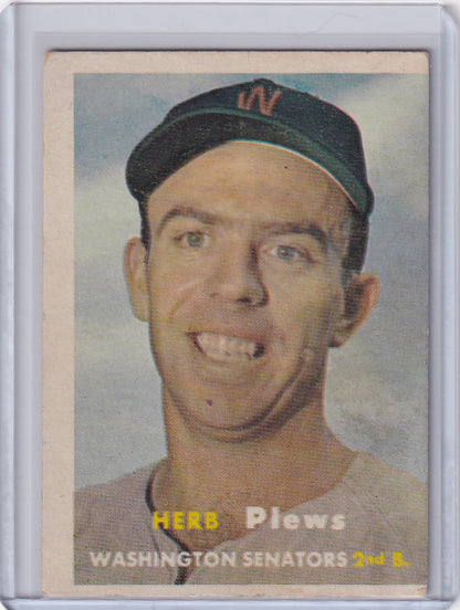 Baseball card of Herb Plews, smiling Washington Senators player in Topps Baseball design