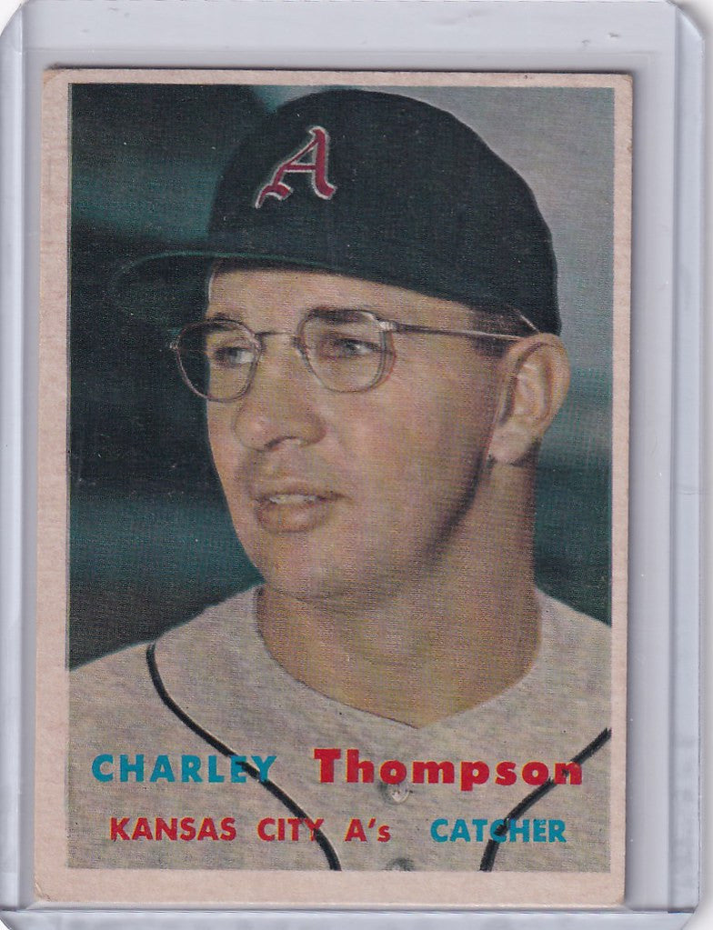 Baseball card of Tim Thompson in cap and glasses from Topps Baseball Kansas City Athletics