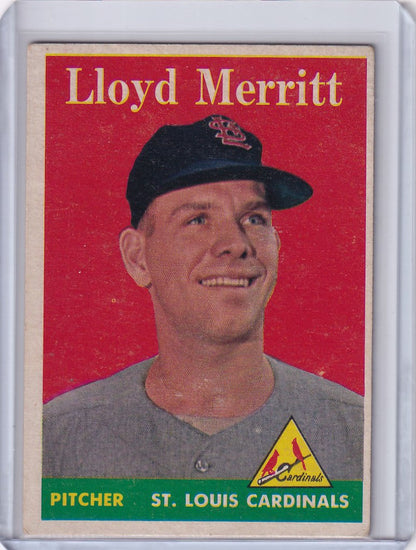 Baseball card of Lloyd Merritt, smiling pitcher for St. Louis Cardinals trading cards