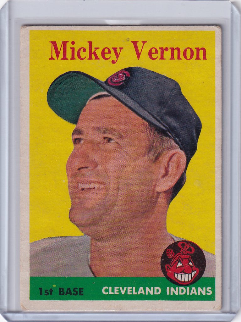 Baseball card of Mickey Vernon smiling in a Cleveland Indians cap from 1958 Topps