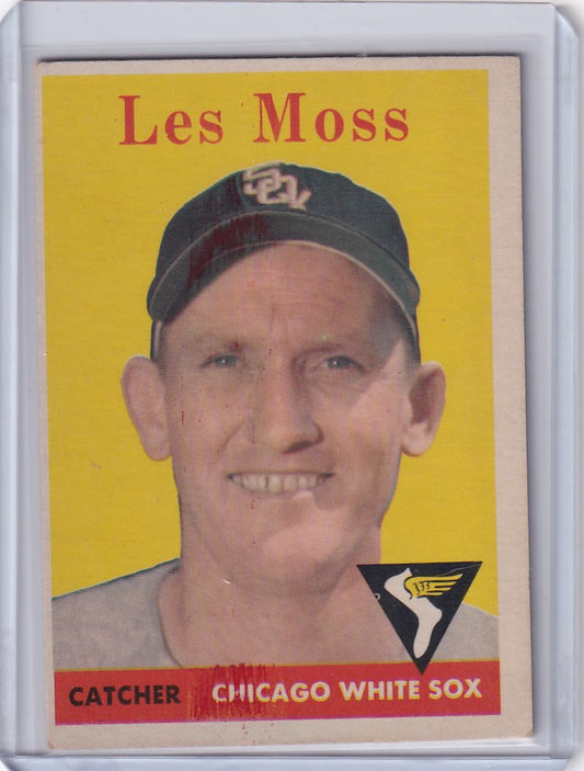 Baseball card of Les Moss smiling, showcasing Chicago White Sox heritage