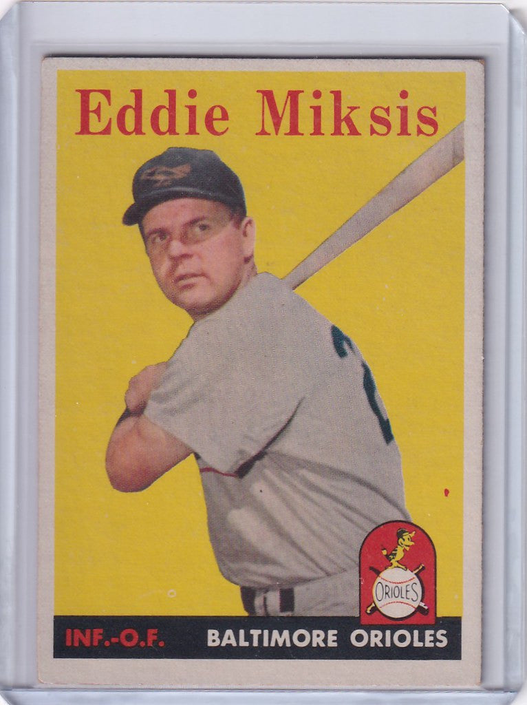 Eddie Miksis batting in Baltimore Orioles uniform on 1958 Topps trading card