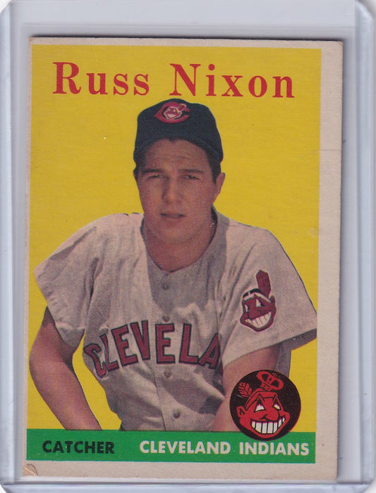 Baseball card of Russ Nixon - Cleveland Indians catcher in white uniform and cap