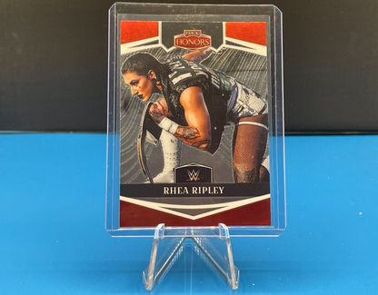 WWE 2023 Panini Chronicles Rhea Ripley Panini Honors card in clear display stand