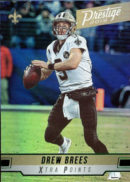 Drew Brees in New Orleans Saints jersey prepares to throw; Panini Prestige Drew card